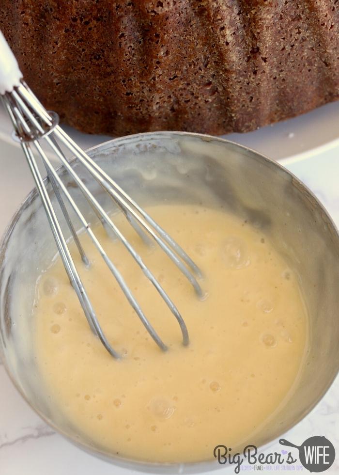 eggnog icing in bowl with whisk