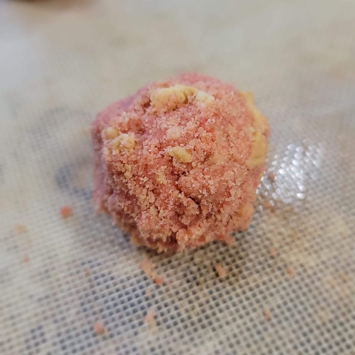 strawberry cookie rolled in crushed strawberry crunch topping