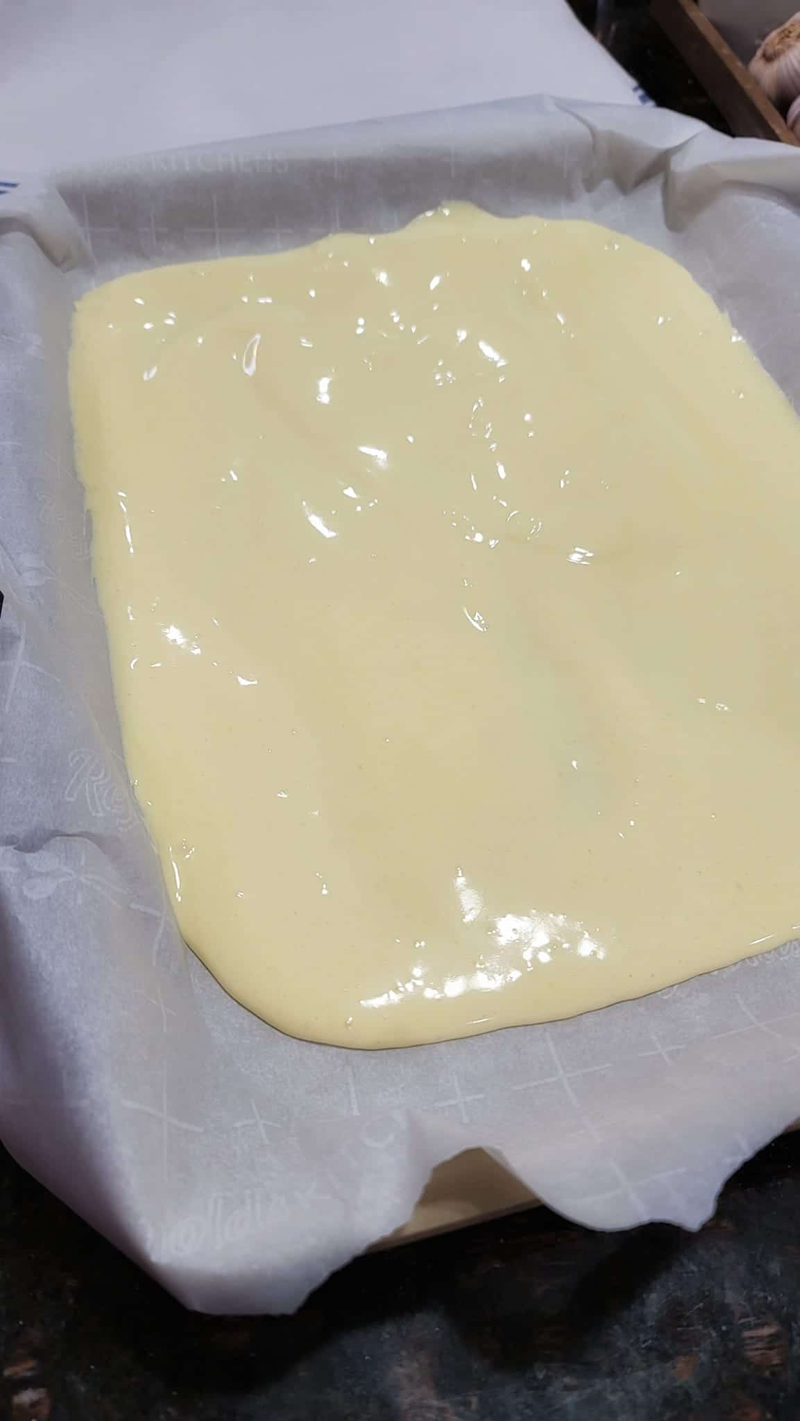 yellow sponge cake batter in pan
