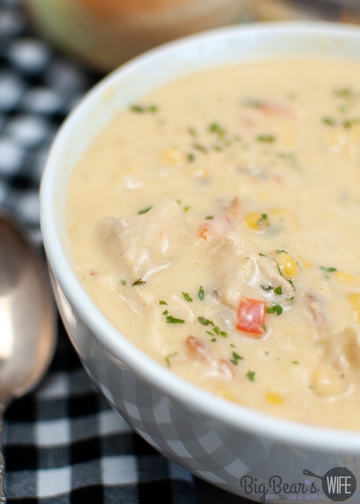 SIDE VIEW CHICKEN CORN CHOWDER IN WHITE BOWL WITH INSTANT POT IN BACKGROUND