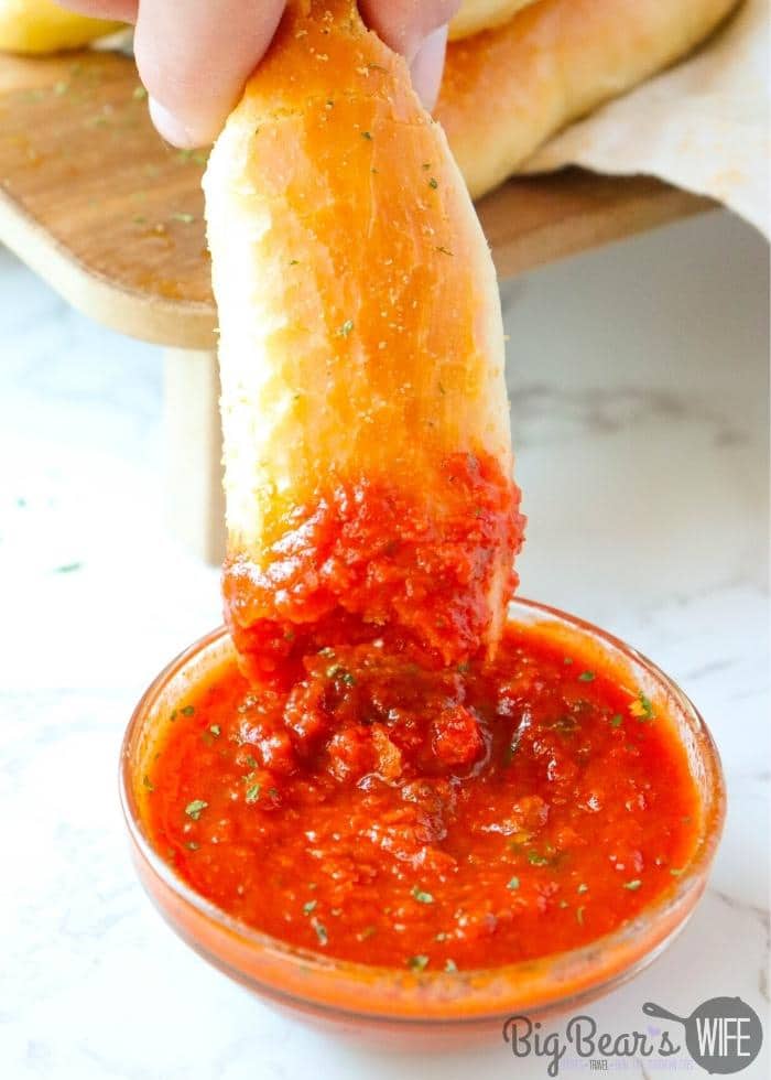 Dipping a COPYCAT OLIVE GARDEN BREADSTICK in pizza sauce (1) (1)
