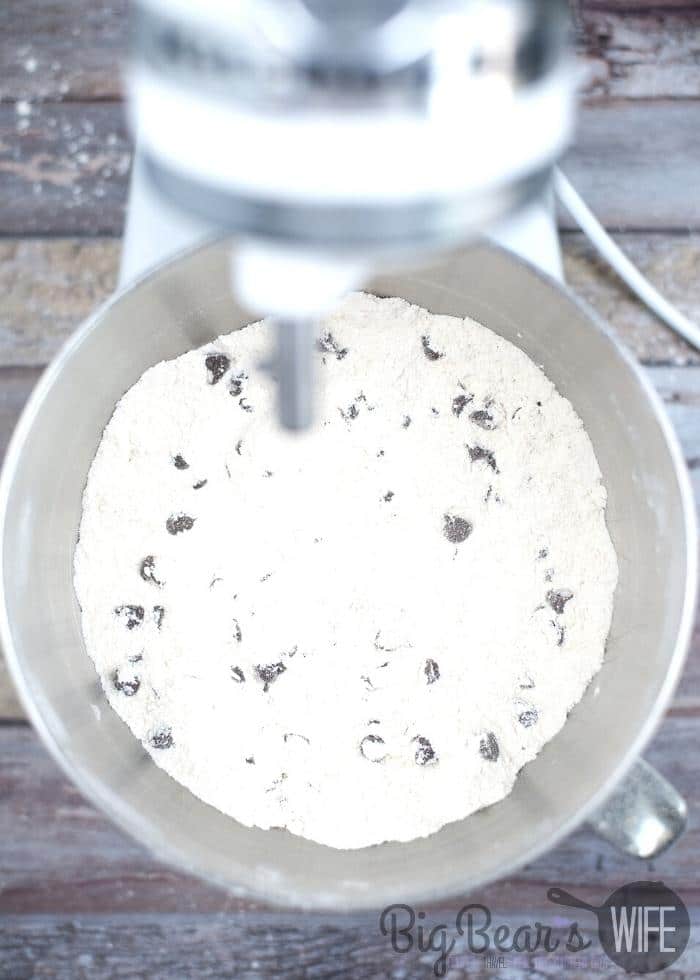 Sugar and Flour Mixed in a mixing bowl with chocolate chips added- Overhead shot
