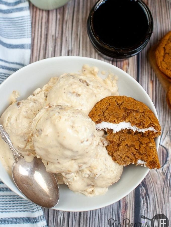 Oatmeal Cream Pie Ice Cream with broken oatmeal cookie snack cake and a blue and white cloth