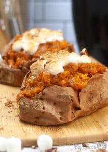 Air Fryer Stuffed Sweet Potatoes topped with toasted mini marshmallows.