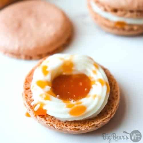 White frosting and salted caramel on center of Salted Caramel Macaron
