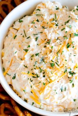 Ranch Beer Cheese Dip is a crazy easy dip recipe that'll be a hit at your next party, tailgate or game day get together! Cream cheese, ranch seasoning, cheese and beer! 4 ingredients and a bit of mixing is all you're going to need for this party dip!