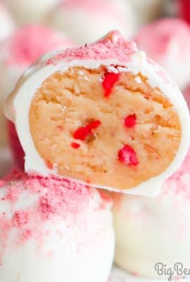 These Strawberry Shortcake Truffles taste just like strawberry shortcake and they’re the perfect dessert for sharing! Pack these up for your Valentine or display them on a cake plate for a party! 