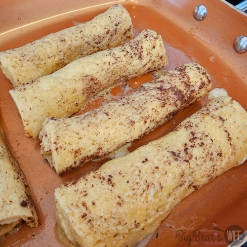 French Roll Ups cooking in a pan