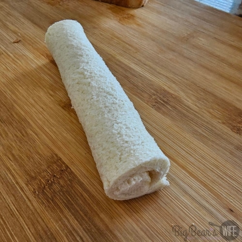 roll each slice of bread “jelly-roll style.”