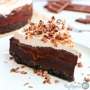 Calling all chocolate fanatics! Prepare to be blown away by the ultimate Mississippi Mud Pie recipe that will transport you to dessert heaven. Dive into a luscious chocolate crust, followed by layers of fudgy brownie, hot fudge sauce and chocolate pudding . Then it is finished with a homemade whipped cream topping and chocolate shavings. This is the dessert dreams are made of!