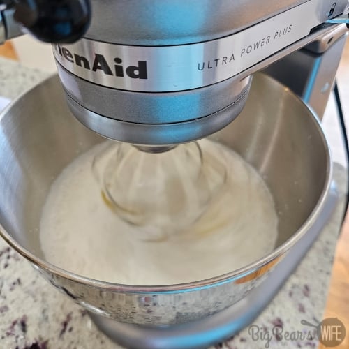 whipping cream in a mixing bowl for ice cream base