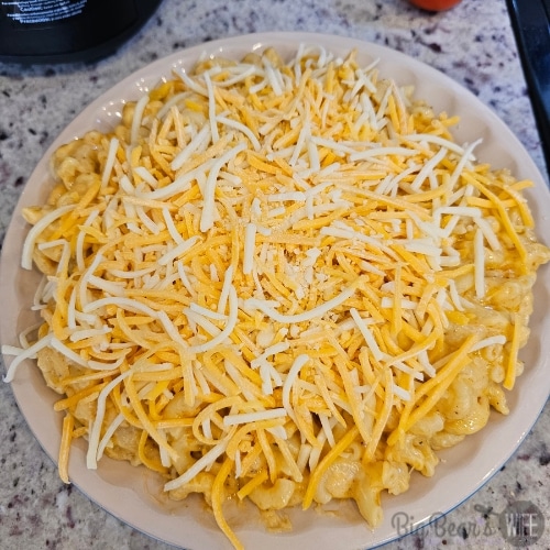 Final layer of Colby Jack on mac and cheese