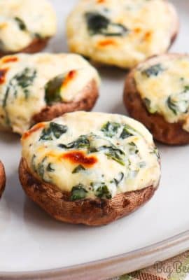 The creamy and flavorful garlic spinach dip perfectly complements the earthy mushrooms, creating a bite that is both decadent and satisfying. Whether you're hosting a party or looking for a gourmet snack, these Garlic Spinach Dip Stuffed Mushrooms will delight your senses and leave you craving more.