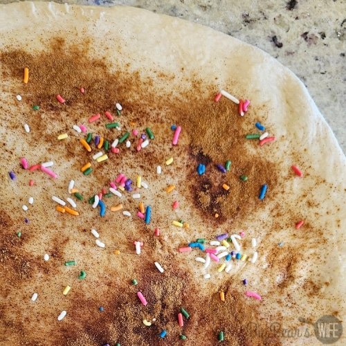 cinnamon and sprinkles on dough