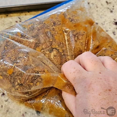 mash bag with hand to mix