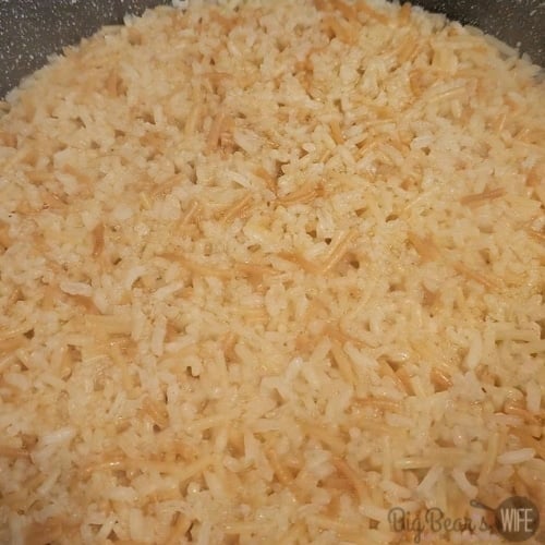layer of rice a roni in skillet