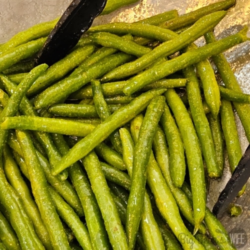raw green beans tossed with EVOO and spices