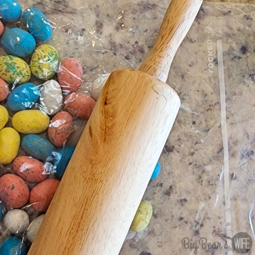 robin eggs in a bag with rolling pin