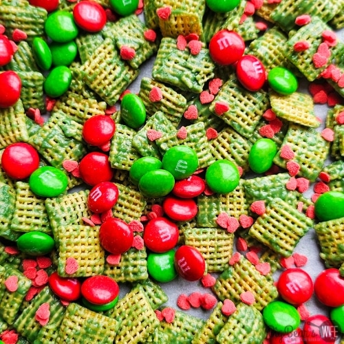 green-chex-mix-on-a-sheet-pan-wiht-mM-candies-and-heart-sprinkles.
