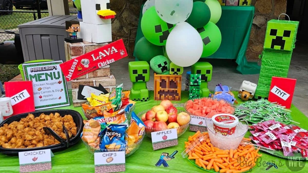 Minecraft birthday party food table with Lava Chicken nuggets, themed signs, and Minecraft decorations