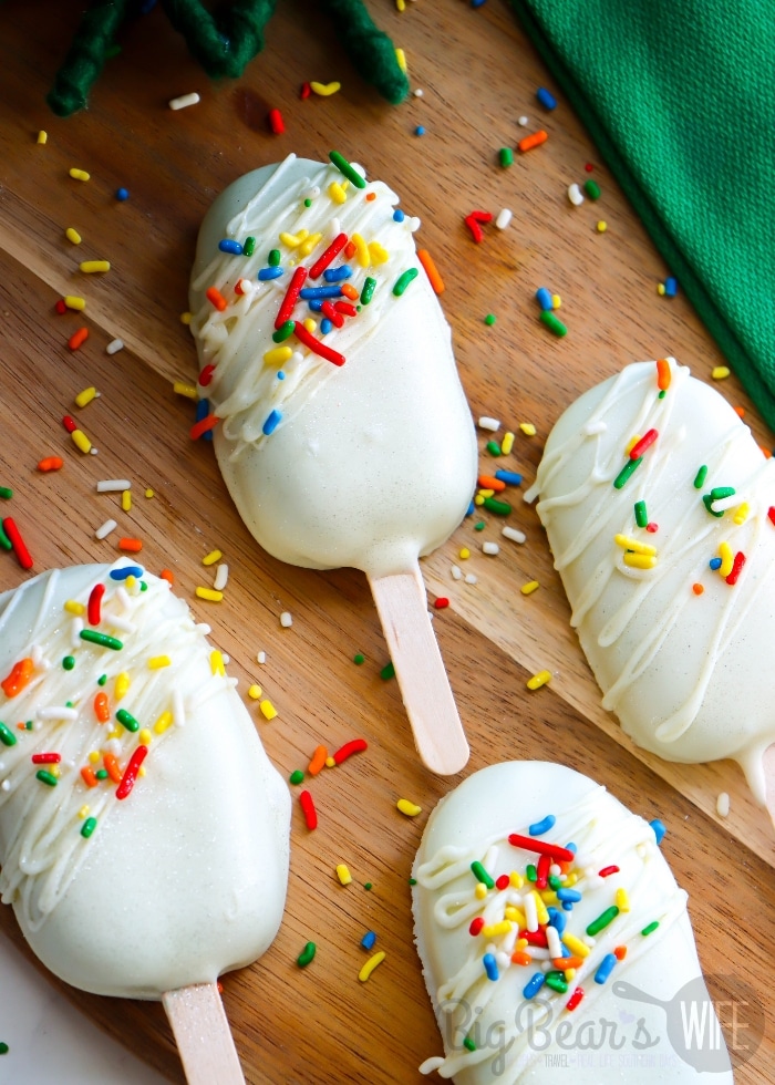 rainbow sprinkle St. Patrick&rsquo;s Day cake pops on popsicle sticks
