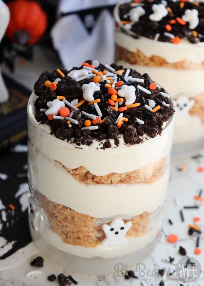 Graveyard Boo-Nana Pudding Cups decorated with ghost faces, crushed Oreo dirt, and candy bones.